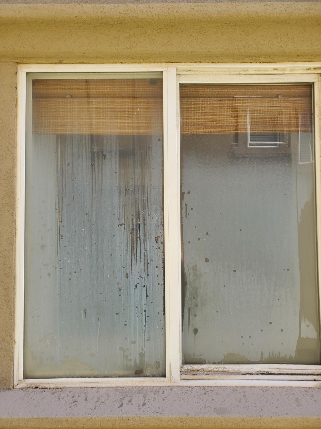 Dirty window with heavy stains