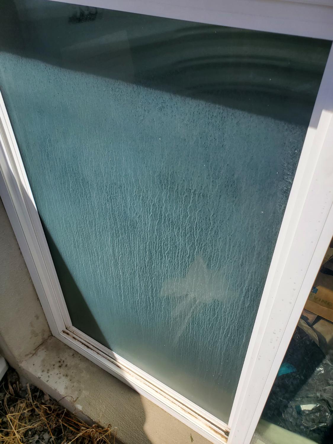 Hard water stains on glass